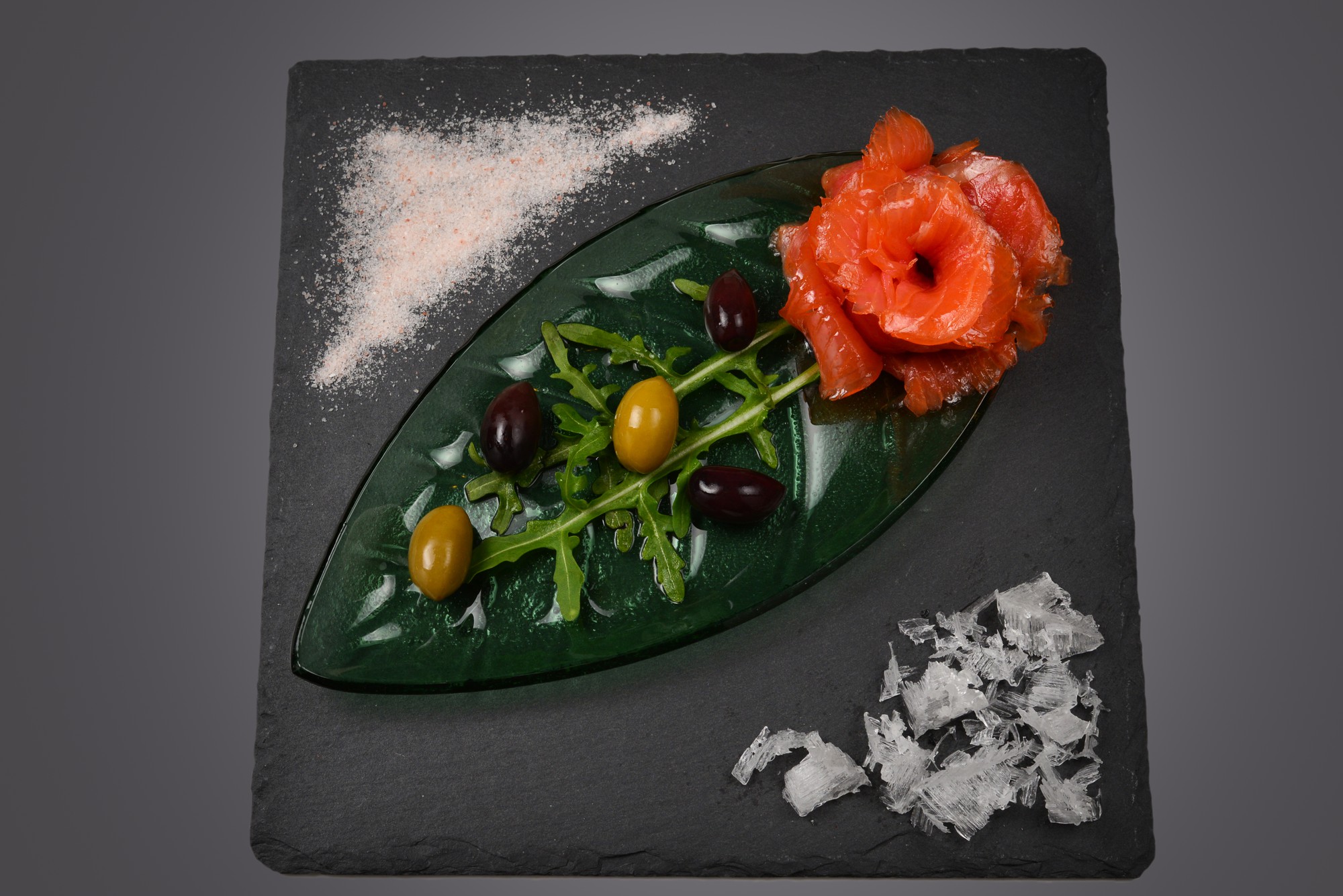Close-up of plated experimental dish on slate